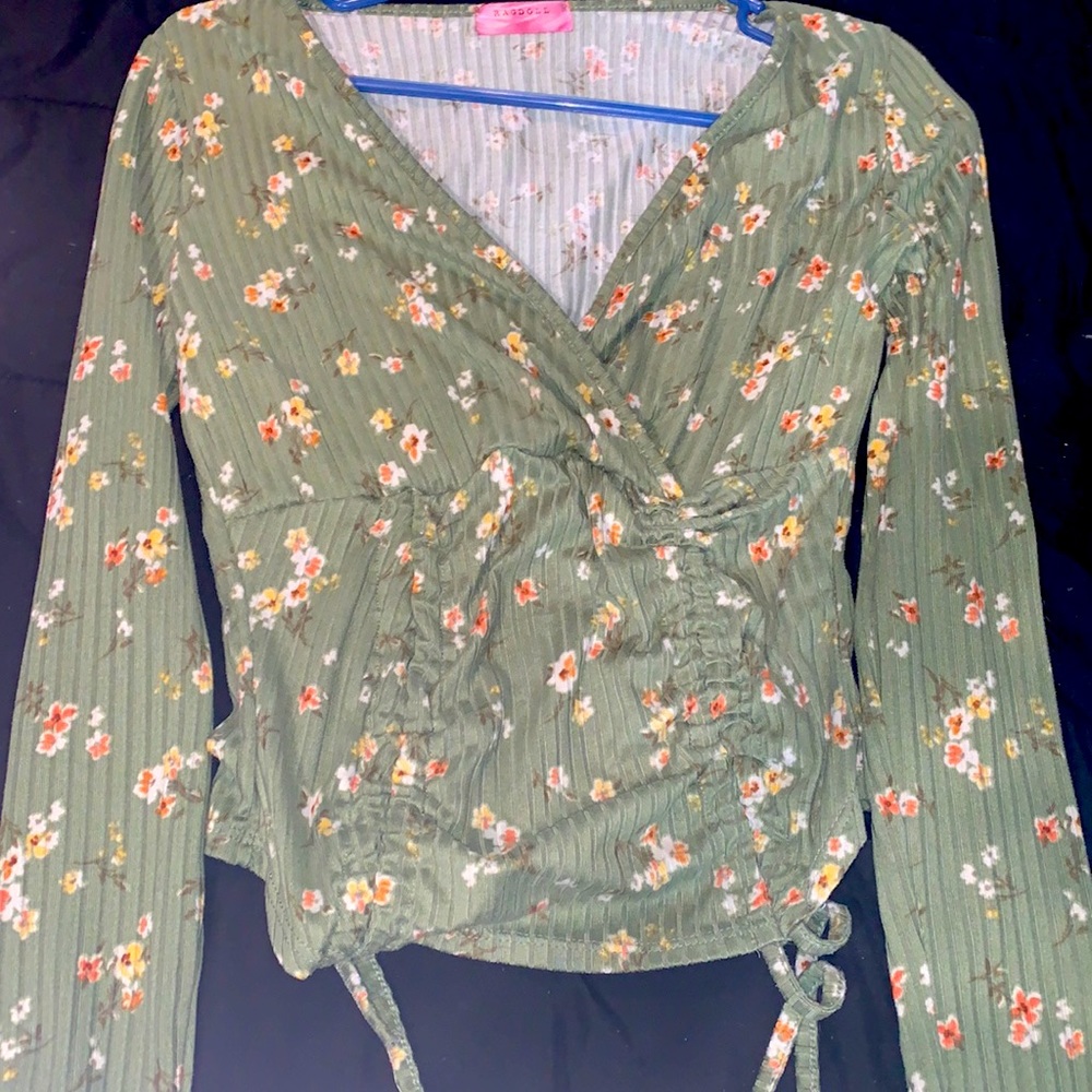 I am selling this beautiful shirt , it is a size medium